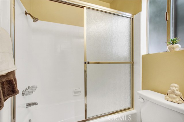 Full size  bathroom. New shower doors, faucets &  hardware, new cabinet , mirror , faucet and flooring.