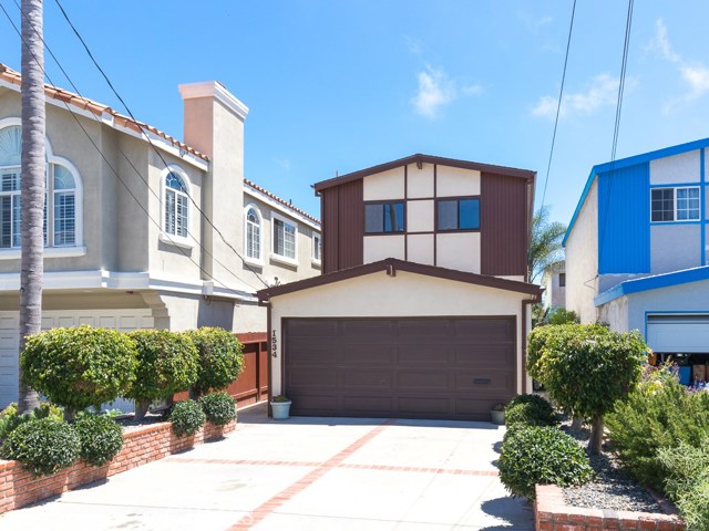 1534 Goodman. West facing, attached 2 car garage, entrance is on the north side of home.