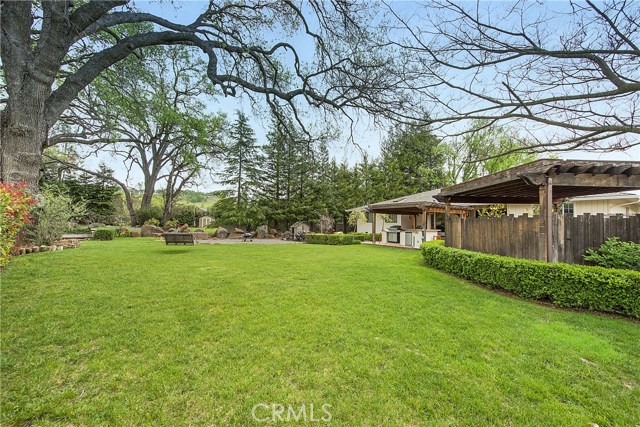 Plenty of lawn area to enjoy under the shade of the towering oaks