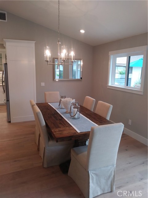 DINING AREA WITH THOSE BEAUTIFUL FLOORS