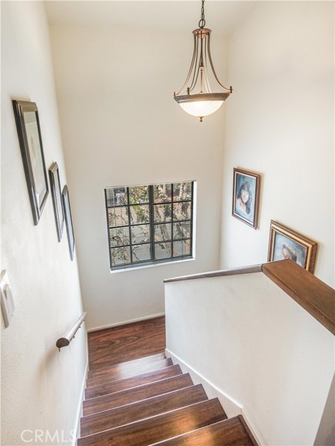 Looking back down the stairs from the upper, bedroom level.