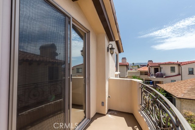 Master balcony has view of gorgeous South Redondo skies with PV hills to southwest.
