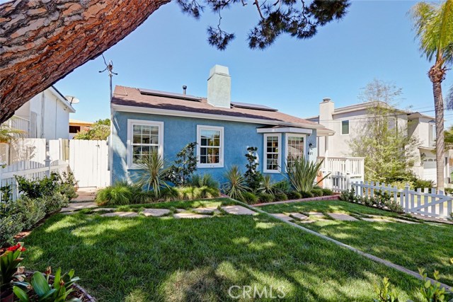 front yard with walk way to side gate which leads to backyard