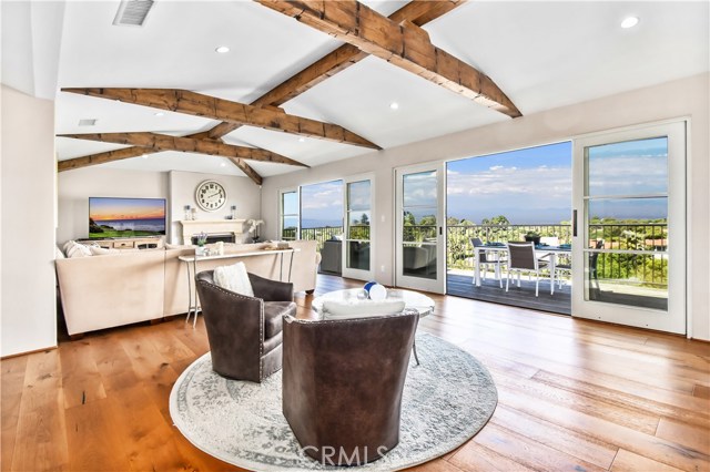 Kolby French doors span the entire living room and dining room