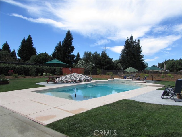 Nice pool with built in area for your umbrella.