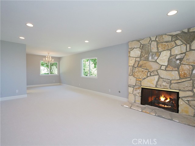 Dining room open to living room (fire is photographer's graphic insertion, not real) Dining room open to living room (fire is photographer's graphic insertion, not real)