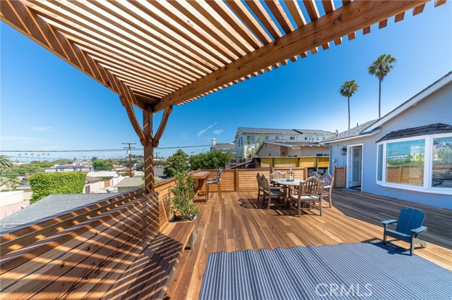 View of deck from built-in seating area.