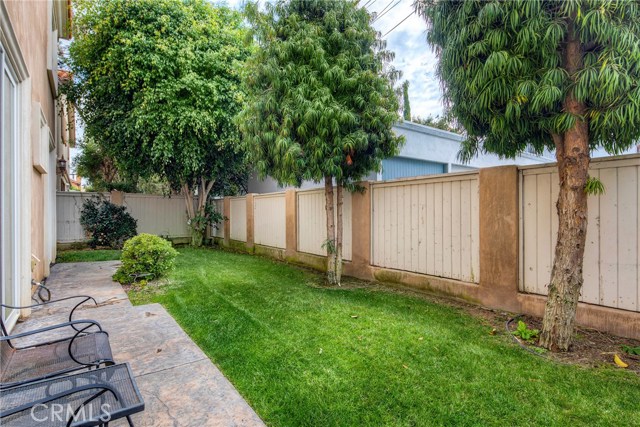 Large, private and grassy landscaped backyard exclusive to rear unit.