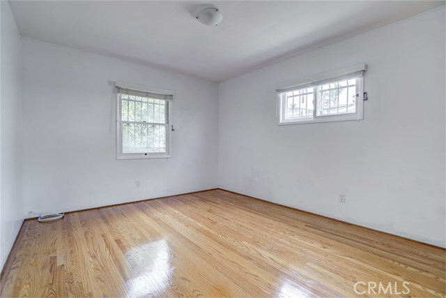 Bedroom #2 - Back Bedroom.  Notice the hardwood flooring. All the wood floors in the bedrooms is in great condition.