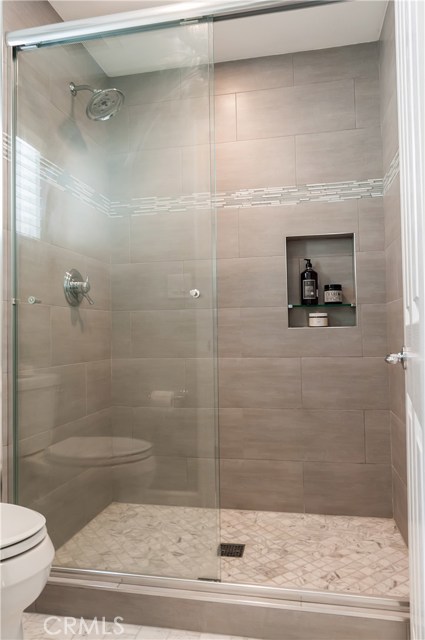 The master bath includes a renovated shower.