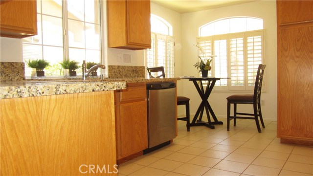 GRANITE - TILE FLOOR - UPBEAT LIGHT AND BRIGHT KITCHEN