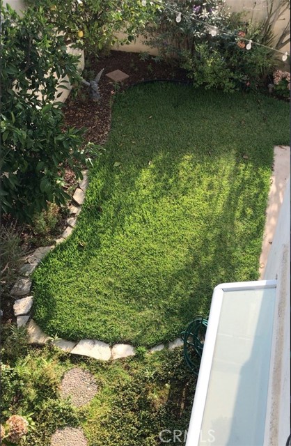 Enjoy the lovely view of your backyard from the balcony.