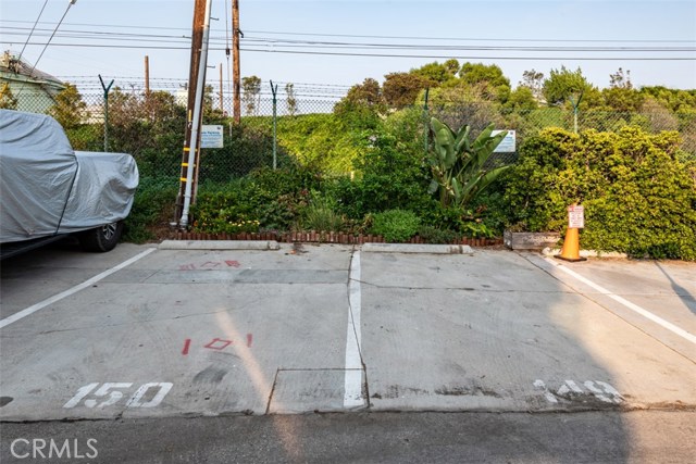Two Parking Spots in Addition to the Two Single Car Garages