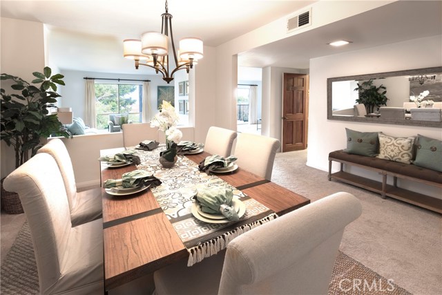 Formal Dining Room looking out onto Family Room.