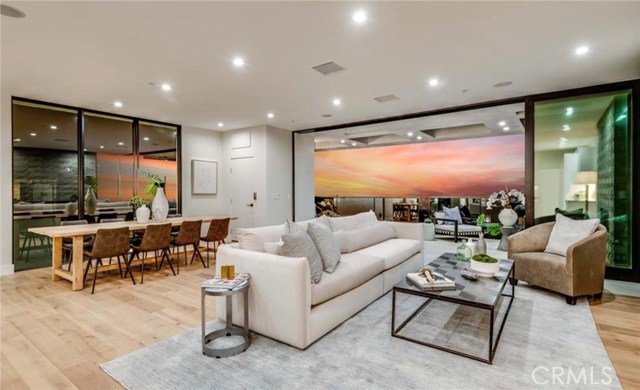 The top floor features the great room that includes the living room, dining room, kitchen, walk in pantry, bath and 2 terraces.