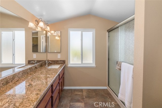 Dark tile flooring looks great with the neutral paint color