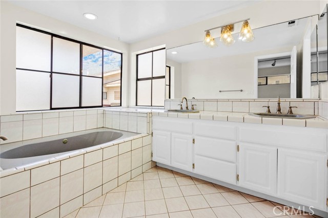 Separate jacuzzi tub and shower in master bath