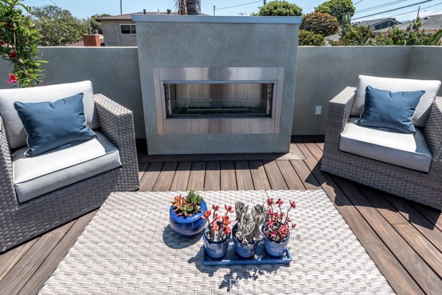 Deck with fireplace off Master Bedroom