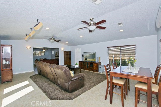 Family Room and Dining Area with recessed lighting