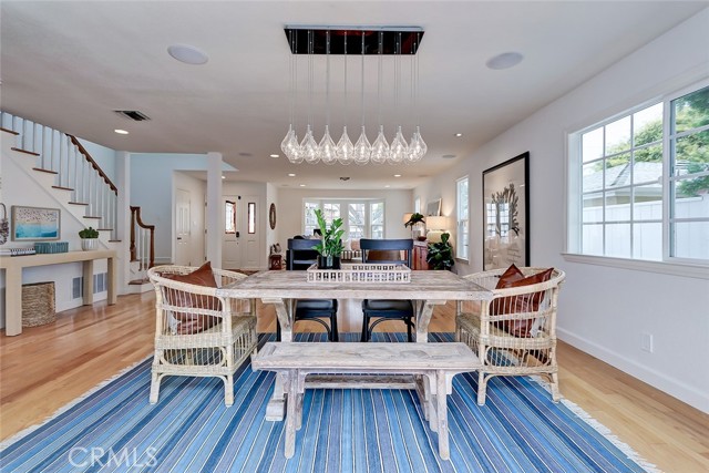 Stunning lighting accents dining area.