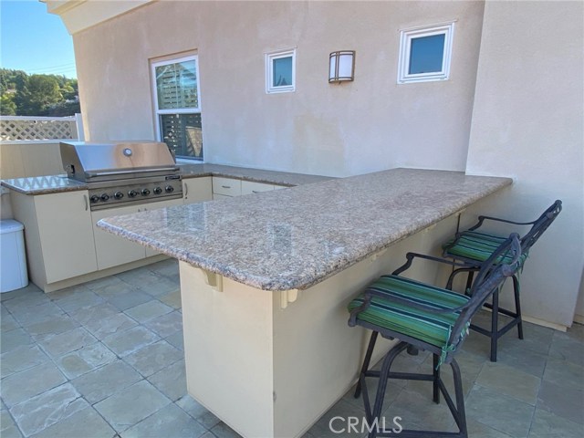 ROOFTOP DECK: BBQ and Granite Counters.