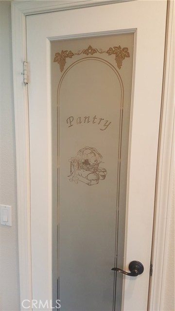 Walk-in Pantry with white stained glass