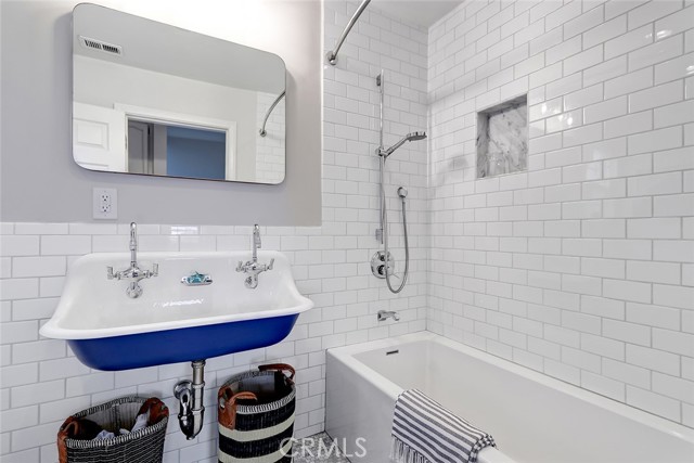 Remodeled bath with tub.