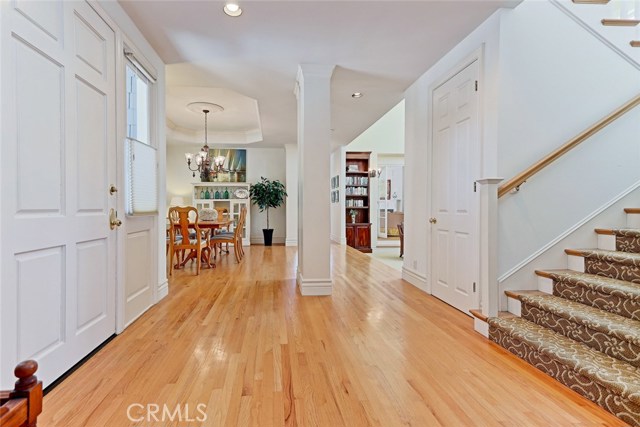 Grand entry opens to formal living room and dining room.