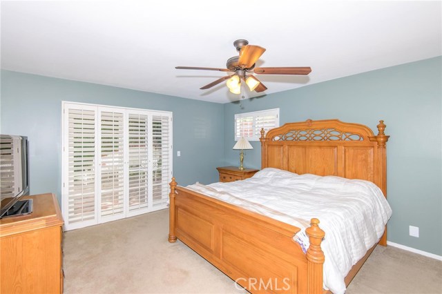 Master bedroom with access to backyard