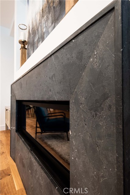 Granite Fireplace face with Custom Tapered Seams.