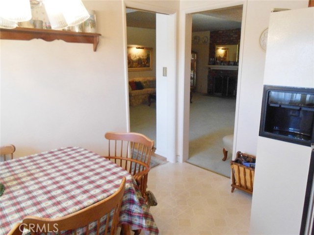 View onto Formal Living Room and Formal Dining Room as Pocket Doors are Hidden.