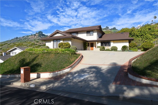 Street view. Large driveway with plenty of parking. Composite roof in great condition.