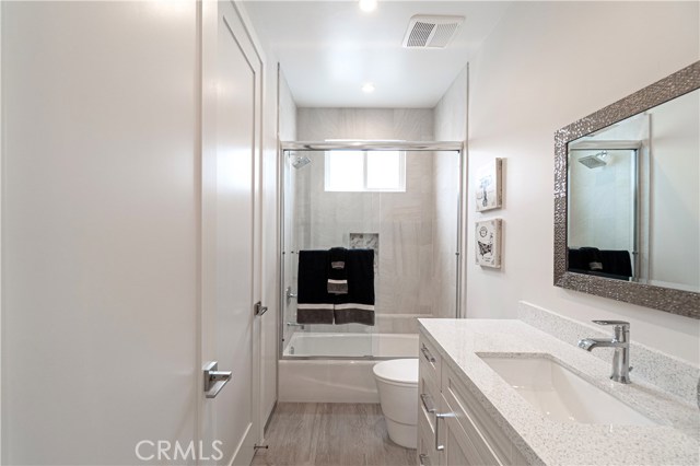 Upstairs Full Bathroom, with access to Upstairs Bedroom.