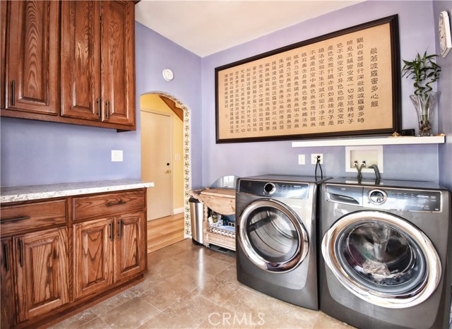 Extra spacious laundry room.