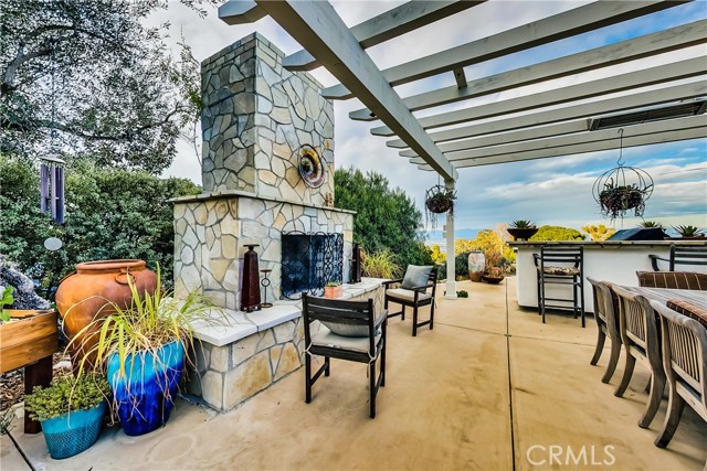 The outdoor fireplace and integrated heating provide for year round enjoyment of this part of the home.