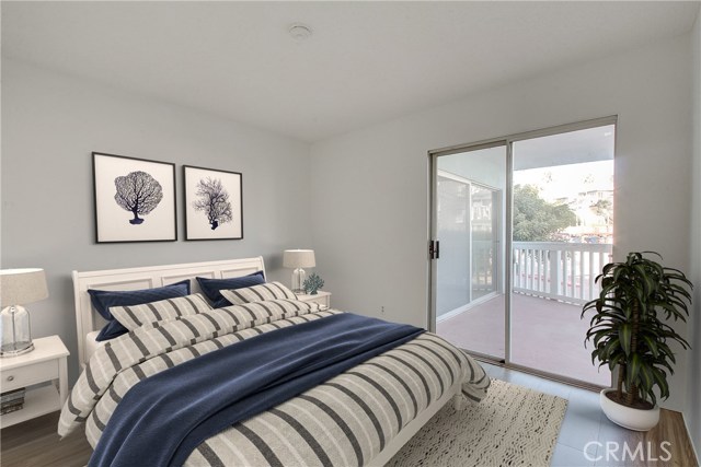 Master Suite with Slider opening to Ocean view balcony w/walk in closet!