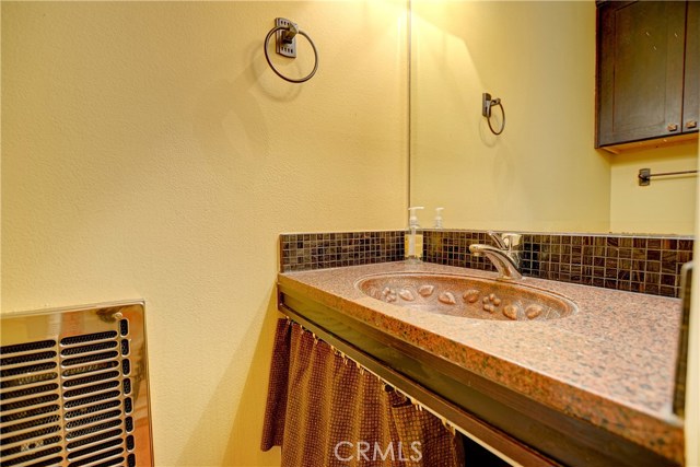 Powder room on ground floor. Powder room on ground floor.