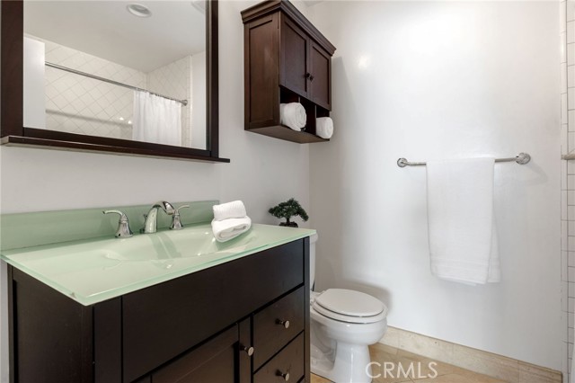 Bath vanity and tub/shower combo (see in the reflection or video tour).