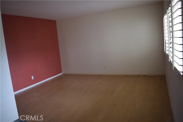 Living room with plantation shutters.
