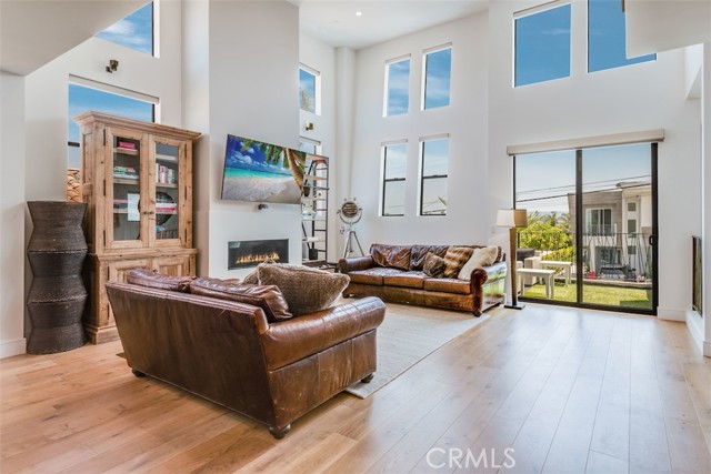 Living room with the voice controlled automatic shades open