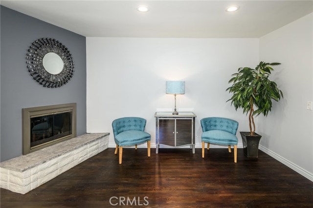 Sitting area by fireplace.