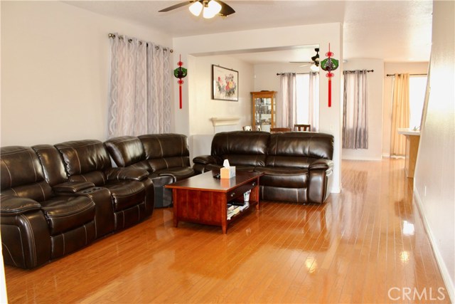 Beautiful hardwood floorings and walls are painted in neutral color, and ceiling fans throughout and every room