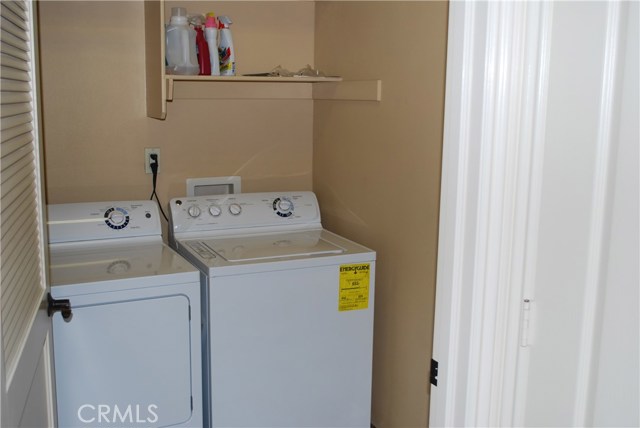Upstairs laundry room conveniently located on the same level as the bedrooms.