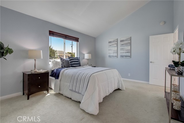 Primary suite with pitched ceilings and en suite bathroom