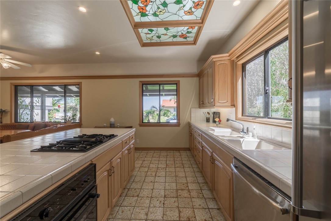 Fresh view of the kitchen from additional dining room...