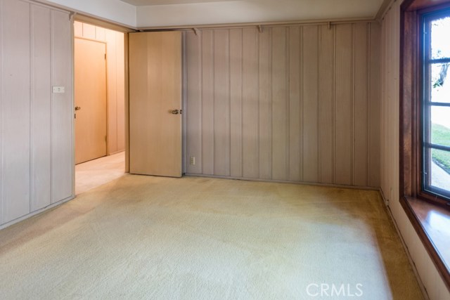 Bedroom with paneling