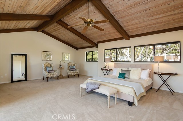 Escape to this huge master retreat where just beyond the "looking glass" is a large storage room.