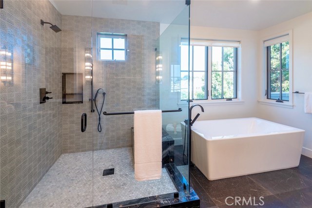 Luxurious soaking tub and spacious shower