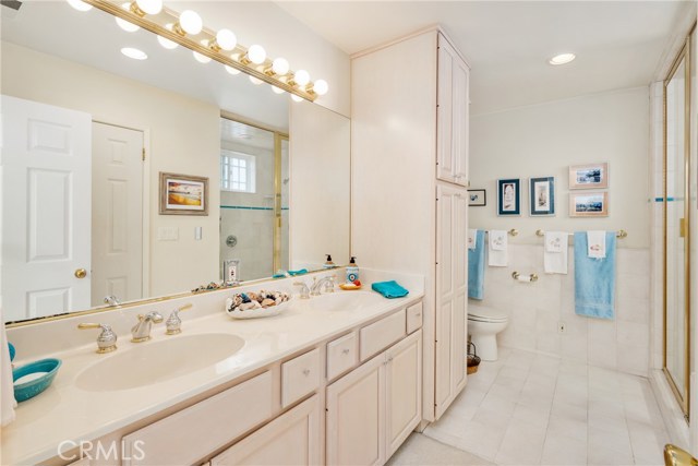 Master bath with dual sinks, walk in shower, loads of storage!