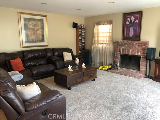 This family room is so large, it easily handles this very large sofa & still has space!